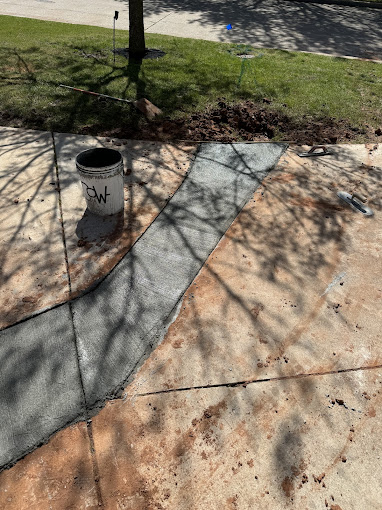 A fire hydrant sitting on the side of a road